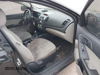 2011 Kia Forte EX with VIN KNAFU4A20B5431981, listed as a IAAI auction lot 41230777 with 143,219 mi miles. Bid and sale history available at carsss.com. Image 5.