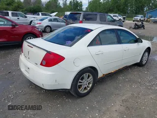 2006 Pontiac G6 6-Cyl with VIN 1G2ZG558664267759, listed as a IAAI auction lot 42762913 with 197,857 mi miles and . Bid and sale history available at DreamBid. Image 4.