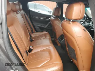 2014 Maserati Ghibli z VIN ZAM57XSA9E1096594, wystawiony jako Copart lot #47187285 z przebiegiem 114 050 mil mil oraz Szkody całkowita. Historia ofert i sprzedaży dostępna na DreamBid. Obrazek 10.