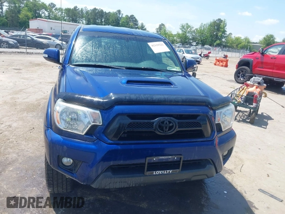 2015 Toyota Tacoma with VIN 3TMLU4EN1FM187705, listed as a IAAI auction lot 42119222 with 115,471 mi miles and . Bid and sale history available at DreamBid. Image 12.
