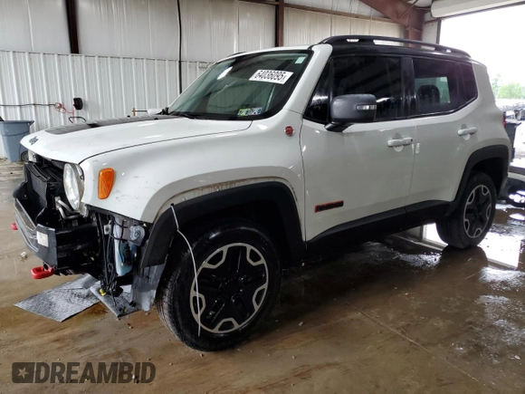 2015 Jeep Renegade Trailhawk with VIN ZACCJBCT8FPB78351, listed as a Copart auction lot 64036095 with 127,784 mi miles and Salvage title. Bid and sale history available at DreamBid. Image 1.