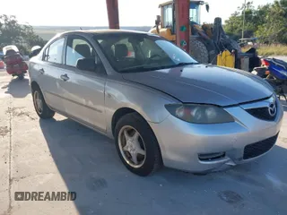 2007 Mazda Mazda3 i Sport with VIN JM1BK12F371721654, listed as a IAAI auction lot 42019268 with 120,518 mi miles. Bid and sale history available at carsss.com. Image 1.