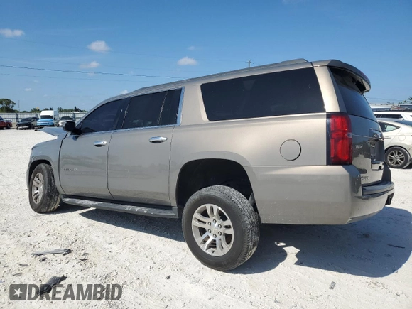 2018 Chevrolet Suburban LS z VIN 1GNSCGKC6JR249746, wystawiony jako Copart lot #55622105 z przebiegiem 126 378 mil mil oraz Szkoda całkowita • Salvage title. Historia ofert i sprzedaży dostępna na DreamBid. Obrazek 2.