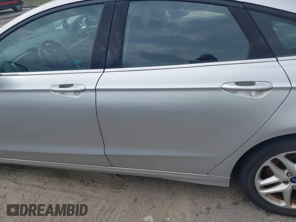 2016 Ford Fusion SE z VIN 3FA6P0H72GR296906, wystawiony jako IAAI lot #42571597 z przebiegiem 242 623 mil mil oraz . Historia ofert i sprzedaży dostępna na DreamBid. Obrazek 14.