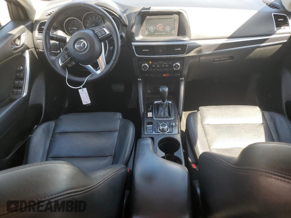 2016 Mazda CX-5 Grand Touring with VIN JM3KE4DY2G0764130, listed as a Copart auction lot 55350145 with 85,503 mi miles and Salvage Title. Bid and sale history available at carsss.com. Image 8.