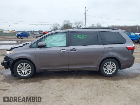 2015 Toyota Sienna XLE with VIN 5TDYK3DC8FS651580, listed as a IAAI auction lot 41971867 with 49,711 mi miles. Bid and sale history available at carsss.com. Image 15.