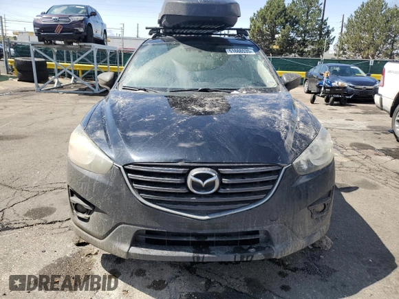 2016 Mazda CX-5 Grand Touring with VIN JM3KE4DYXG0730145, listed as a Copart auction lot 51666535 with 117,677 mi miles and Salvage Title. Bid and sale history available at carsss.com. Image 5.