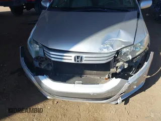 2010 Honda Insight LX z VIN JHMZE2H53AS007016, wystawiony jako IAAI lot #42096274 z przebiegiem 173 519 mil mil oraz . Historia ofert i sprzedaży dostępna na DreamBid. Obrazek 6.