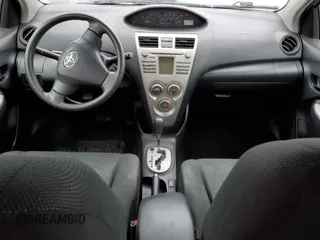 2010 Toyota Yaris with VIN JTDBT4K39A1380336, listed as a Copart auction lot 51855835 with 141,745 mi miles and Salvage Title. Bid and sale history available at DreamBid. Image 8.