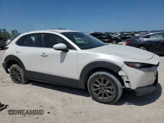 2023 Mazda CX-30 S with VIN 3MVDMBAM3PM575394, listed as a Copart auction lot 52531455 with 51,155 mi miles and Salvage title. Bid and sale history available at DreamBid. Image 4.