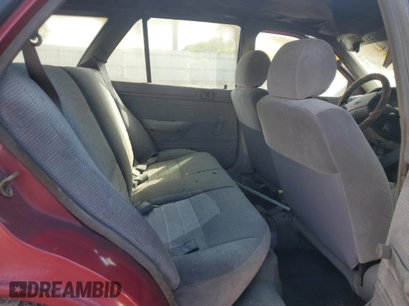 1995 Ford Escort z VIN 1FASP15J1SW344941, wystawiony jako Copart lot #73689754 z przebiegiem Nie podano mil oraz Nie do naprawy. Historia ofert i sprzedaży dostępna na DreamBid. Obrazek 10.