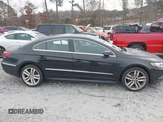 2014 Volkswagen CC Lux with VIN WVWRP7AN3EE537770, listed as a IAAI auction lot 41385247 with 135,069 mi miles. Bid and sale history available at carsss.com. Image 13.