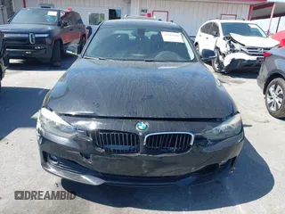 2014 BMW 3 Series 320i with VIN WBA3B1G5XENS80130, listed as a IAAI auction lot 42304306 with 125,743 mi miles and . Bid and sale history available at DreamBid. Image 11.
