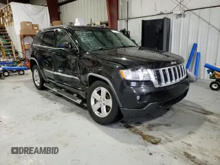 2012 Jeep Grand Cherokee Laredo with VIN 1C4RJEAG4CC146160, listed as a Copart auction lot 87515345 with 116,936 mi miles and Salvage Title. Bid and sale history available at carsss.com. Image 12.