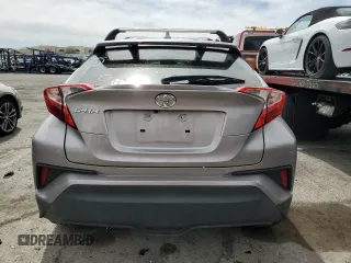 2020 Toyota C-HR LE with VIN JTNKHMBX7L1065098, listed as a Copart auction lot 50101395 with 51,933 mi miles and Salvage Title. Bid and sale history available at DreamBid. Image 6.