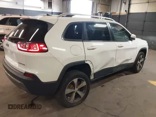2019 Jeep Cherokee Limited z VIN 1C4PJMDXXKD294822, wystawiony jako IAAI lot #41995583 z przebiegiem 135 688 mil mil oraz . Historia ofert i sprzedaży dostępna na DreamBid. Obrazek 4.