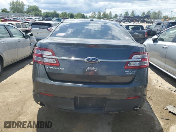 2015 Ford Taurus Limited z VIN 1FAHP2F87FG170997, wystawiony jako Copart lot #54346554 z przebiegiem Nie podano mil oraz Szkoda całkowita • Salvage title. Historia ofert i sprzedaży dostępna na DreamBid. Obrazek 6.