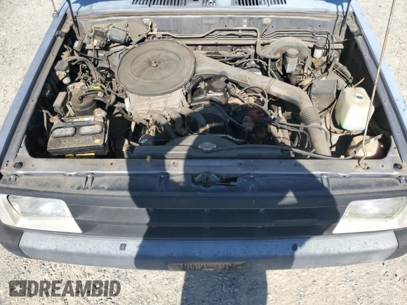 1993 Mazda B-Series Truck z VIN JM2UF3130P0378304, wystawiony jako Copart lot #58799925 z przebiegiem 132 801 mil mil oraz Szkoda całkowita • Salvage title. Historia ofert i sprzedaży dostępna na DreamBid. Obrazek 11.