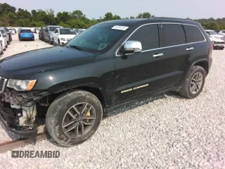 2017 Jeep Grand Cherokee Limited with VIN 1C4RJFBT3HC761680, listed as a Copart auction lot 59788135 with 148,123 mi miles and Salvage title. Bid and sale history available at DreamBid. Image 1.