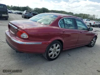 2004 Jaguar X-Type with VIN SAJEA51CX4WD60022, listed as a Copart auction lot 70491824 with 121,443 mi miles and Salvage Title. Bid and sale history available at carsss.com. Image 3.