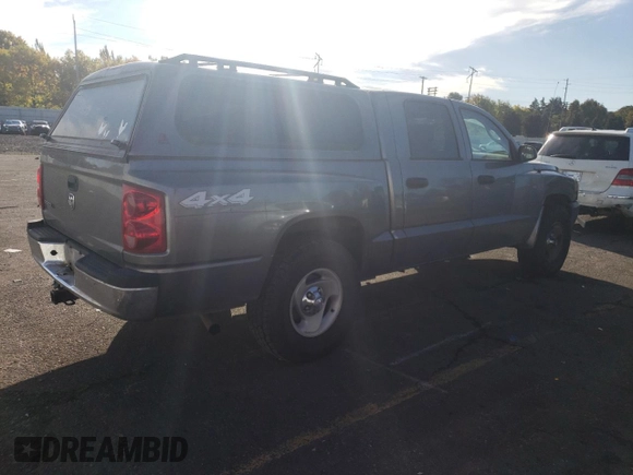 2006 Dodge Dakota ST with VIN 1D7HW28K96S716210, listed as a Copart auction lot 77416344 with 115,973 mi miles and Salvage Title. Bid and sale history available at DreamBid. Image 3.