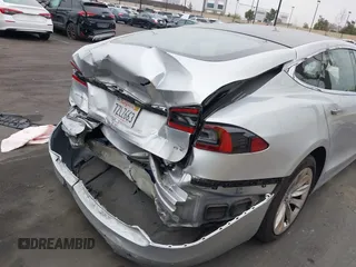 2017 Tesla Model S 60 with VIN 5YJSA1E17HF189627, listed as a IAAI auction lot 41891766 with 106,003 mi miles and . Bid and sale history available at DreamBid. Image 20.