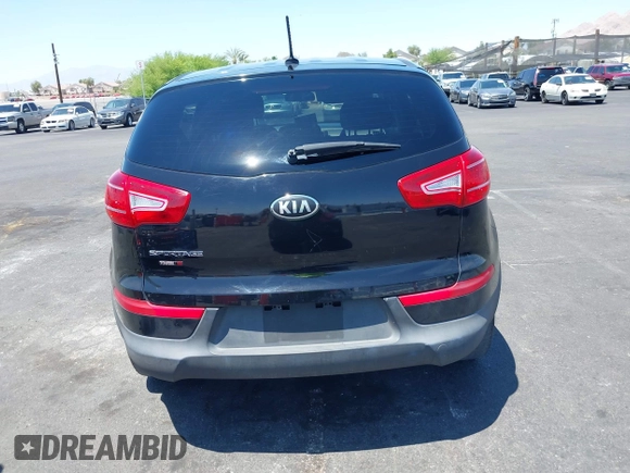 2013 Kia Sportage LX with VIN KNDPBCA25D7449584, listed as a IAAI auction lot 42489414 with 100,993 mi miles and . Bid and sale history available at DreamBid. Image 16.