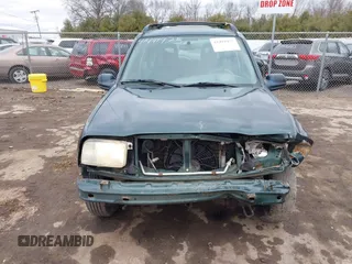 2002 Chevrolet Tracker z VIN 2CNBJ13C126946857, wystawiony jako IAAI lot #41491975 z przebiegiem Nie podano mil oraz . Historia ofert i sprzedaży dostępna na DreamBid. Obrazek 13.