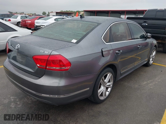 2013 Volkswagen Passat SE with VIN 1VWBN7A34DC148052, listed as a IAAI auction lot 42423919 with 83,634 mi miles and . Bid and sale history available at DreamBid. Image 4.