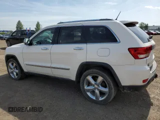 2011 Jeep Grand Cherokee Overland with VIN 1J4RR6GG3BC718723, listed as a Copart auction lot 64975275 with 272,922 mi miles and Salvage title. Bid and sale history available at DreamBid. Image 2.