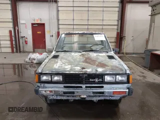 1982 Datsun 720 z VIN JN6MD01S7CW103064, wystawiony jako IAAI lot #41831434 z przebiegiem 175 954 mil mil oraz . Historia ofert i sprzedaży dostępna na DreamBid. Obrazek 11.