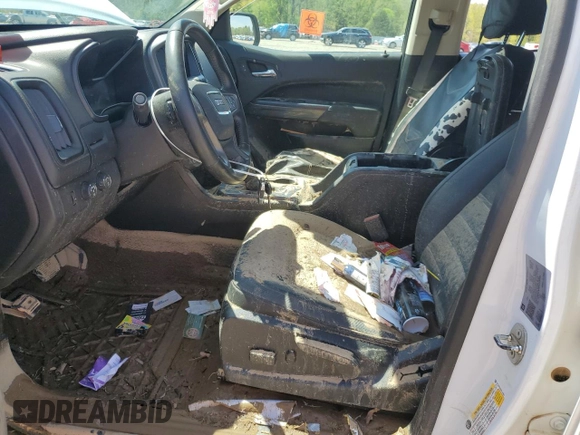 2021 GMC Canyon 4WD AT4 z VIN 1GTG6FEN5M1118081, wystawiony jako Copart lot #52452785 z przebiegiem 92 960 mil mil oraz Szkody całkowita. Historia ofert i sprzedaży dostępna na DreamBid. Obrazek 7.