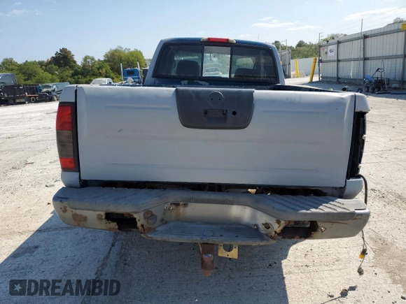 2003 Nissan Frontier XE with VIN 1N6ED26Y03C462996, listed as a Copart auction lot 69848804 with Not provided miles and Salvage title. Bid and sale history available at DreamBid. Image 6.