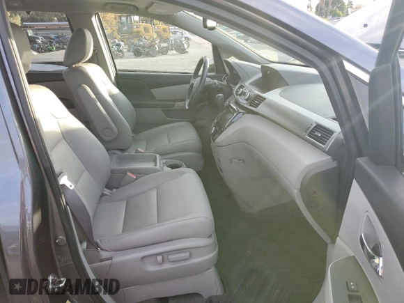 2017 Honda Odyssey Touring с VIN 5FNRL5H9XHB001121, выставлен на аукционе Copart как лот 81855504 с пробегом Не указан миль и Списание • Salvage title. История ставок и продаж доступна на DreamBid. Изображение 7.