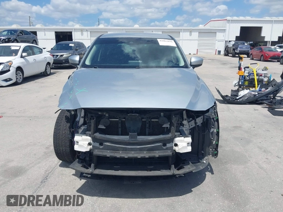 2017 Mazda CX-5 Sport with VIN JM3KFABLXH0135560, listed as a IAAI auction lot 42062016 with 153,416 mi miles. Bid and sale history available at carsss.com. Image 13.