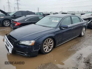 2011 Audi A8 z VIN WAURVAFD3BN013210, wystawiony jako Copart lot #86853824 z przebiegiem Nie podano mil oraz Tytuł czysty. Historia ofert i sprzedaży dostępna na DreamBid. Obrazek 1.