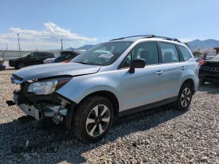 2018 Subaru Forester z VIN JF2SJABC3JH600518, wystawiony jako Copart lot #62151835 z przebiegiem 73 427 mil mil oraz Szkoda całkowita • Salvage title. Historia ofert i sprzedaży dostępna na DreamBid. Obrazek 1.