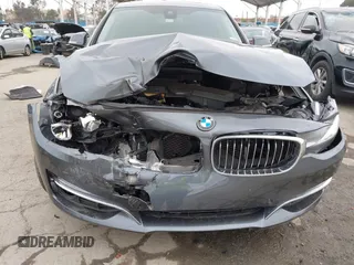 2015 BMW 3 Series 328i Gran Turismo xDrive with VIN WBA3X5C50FD559804, listed as a IAAI auction lot 41902204 with 88,891 mi miles and . Bid and sale history available at DreamBid. Image 6.