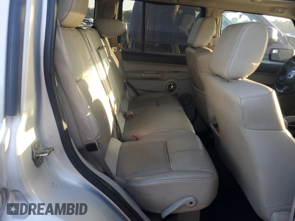2006 Jeep Commander Limited z VIN 1J8HG58296C170388, wystawiony jako Copart lot #61134795 z przebiegiem 117 992 mil mil oraz Szkoda całkowita • Salvage title. Historia ofert i sprzedaży dostępna na DreamBid. Obrazek 11.