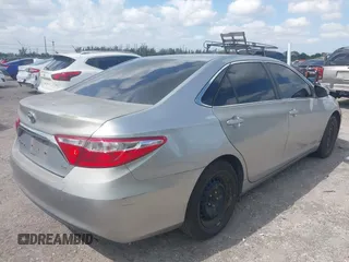 2015 Toyota Camry XLE with VIN 4T1BF1FK0FU093475, listed as a IAAI auction lot 42061877 with 131,618 mi miles. Bid and sale history available at carsss.com. Image 4.