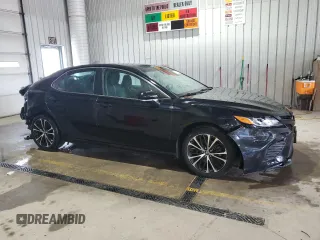 2018 Toyota Camry LE с VIN 4T1B11HK4JU153570, выставлен на аукционе Copart как лот 60234785 с пробегом 75 862 миль миль и Списание • Salvage title. История ставок и продаж доступна на DreamBid. Изображение 4.