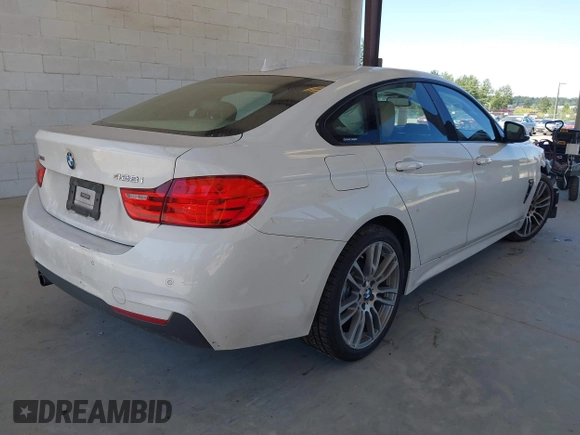 2015 BMW 4 Series 428i xDrive z VIN WBA4A7C55FD413965, wystawiony jako IAAI lot #42368615 z przebiegiem 108 308 mil mil oraz . Historia ofert i sprzedaży dostępna na DreamBid. Obrazek 4.