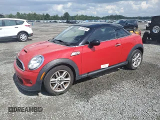 2012 MINI Coupe S z VIN WMWSX3C54CT155356, wystawiony jako Copart lot #72522854 z przebiegiem 91 982 mil mil oraz Szkody całkowita. Historia ofert i sprzedaży dostępna na DreamBid. Obrazek 1.