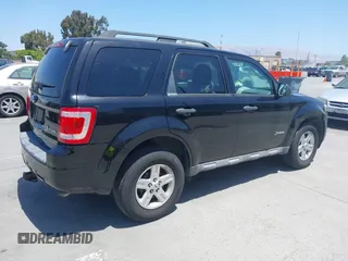2009 Ford Escape Hybrid with VIN 1FMCU59369KB78293, listed as a IAAI auction lot 42478254 with 145,158 mi miles and . Bid and sale history available at DreamBid. Image 4.