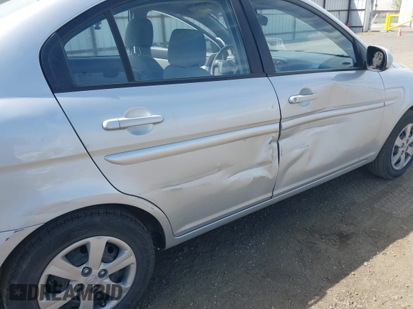 2010 Hyundai Accent GLS with VIN KMHCN4AC1AU476326, listed as a IAAI auction lot 42141297 with 203,607 mi miles. Bid and sale history available at carsss.com. Image 6.