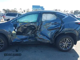 2023 Lexus NX 250 z VIN 2T2ADCAZXPC003877, wystawiony jako IAAI lot #41593097 z przebiegiem 14 597 mil mil oraz . Historia ofert i sprzedaży dostępna na DreamBid. Obrazek 6.