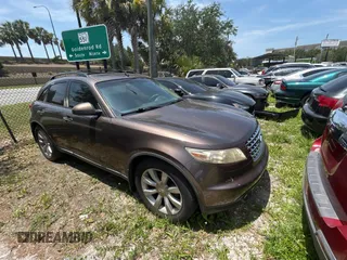 2003 Infiniti FX Options z VIN JNRAS08W93X205643, wystawiony jako Copart lot #58410885 z przebiegiem 210 110 mil mil oraz Tytuł czysty. Historia ofert i sprzedaży dostępna na DreamBid. Obrazek 1.