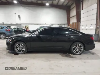 2019 Audi A6 Premium z VIN WAUK2AF23KN019159, wystawiony jako IAAI lot #42077173 z przebiegiem 64 970 mil mil oraz . Historia ofert i sprzedaży dostępna na DreamBid. Obrazek 14.