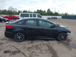 2015 Ford Focus SE with VIN 1FADP3F27FL386775, listed as a IAAI auction lot 42133393 with 102,960 mi miles and . Bid and sale history available at DreamBid. Image 14.