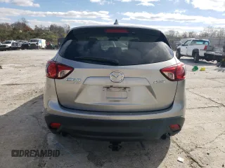 2013 Mazda CX-5 Grand Touring with VIN JM3KE4DE8D0102280, listed as a Copart auction lot 79750774 with 151,797 mi miles and Salvage Title. Bid and sale history available at DreamBid. Image 6.
